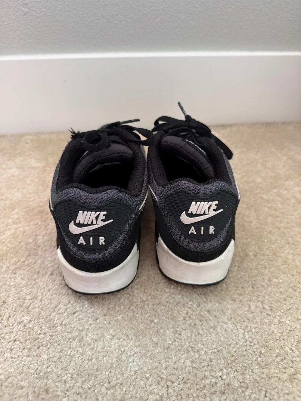 Nike gray and black Air Max sneakers with white Swoosh bits size 6